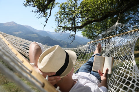 Young-man-reading-in-hammock