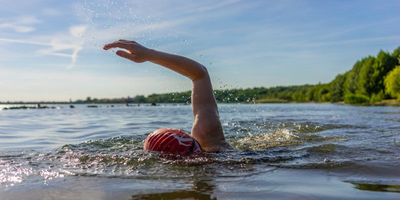 Person swimming in open water