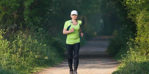 woman wearing a cap on a run