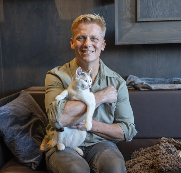 Dr Scott Miller holding a cat