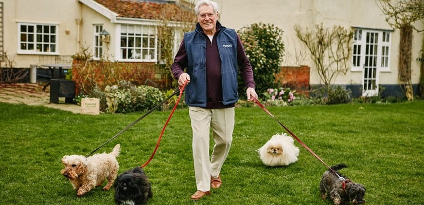 Peter Purves walking his dogs