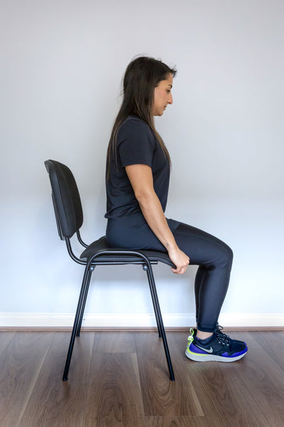 Woman performing at-home exercise