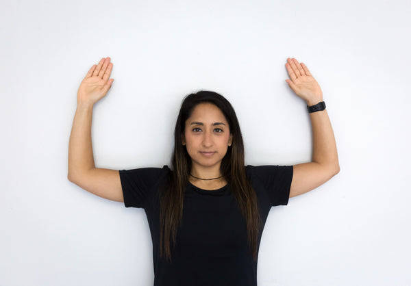 Woman performing at-home exercise