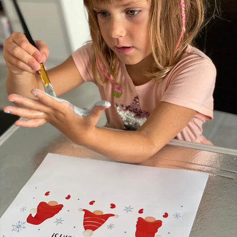 The adorable Gnome Handprint Art is the perfect Student Activity for your classroom featuring an adorable gnomes on a winter background, in their red coloured caps, reading There's no place like gnome for the Holidays.