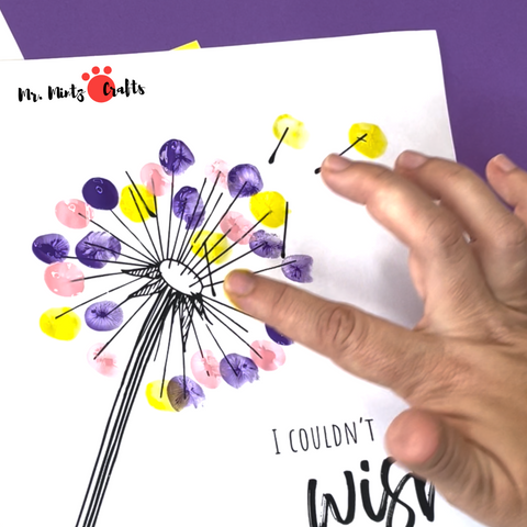 Mom will adore this simple fingerprint Mother's Day art which works great for even the littlest kids to give to mom.