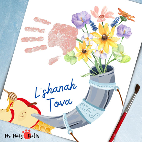 Rosh Hashanah handprint craft featuring a shofar, apples, and flowers with Shana Tova inscription, perfect for a memorable celebration.