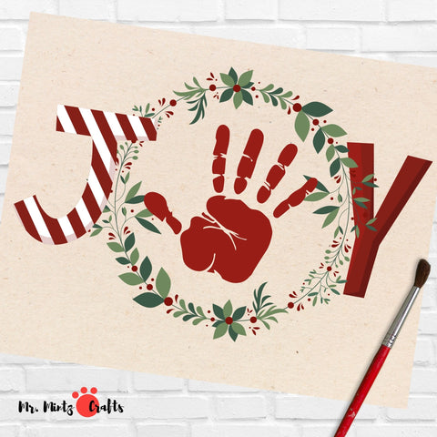 This Christmas JOY Handprint Craft is the perfect gift to send home to the parents for the holidays. Perfect for a teacher's card to go with an end-of-year gift.