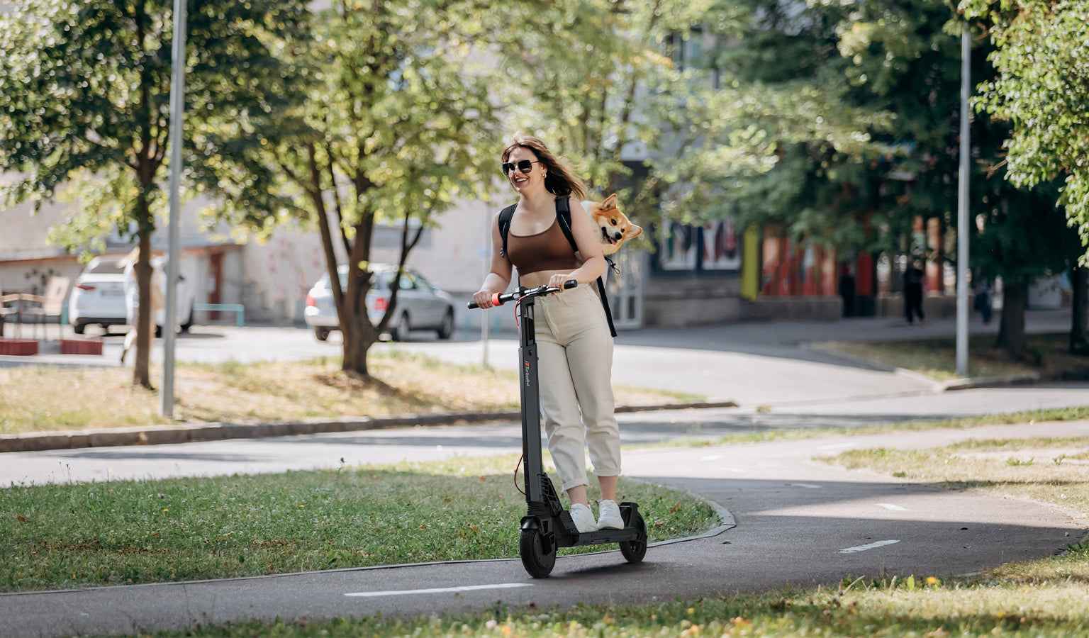 Summer Riding on an Electric Scooter