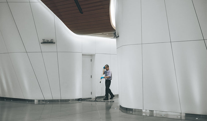 A man working late night exposed to indoor lights emitting blue light