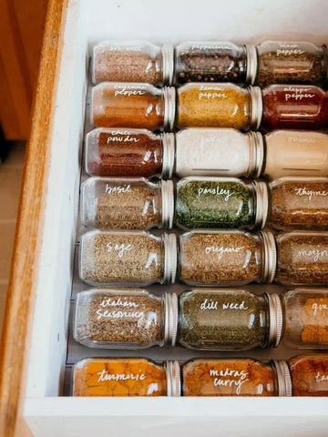 bulk food storage in glass jars organised neatly in a drawer