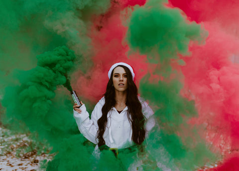 Red and green smoke bomb grenade for holiday photoshoot