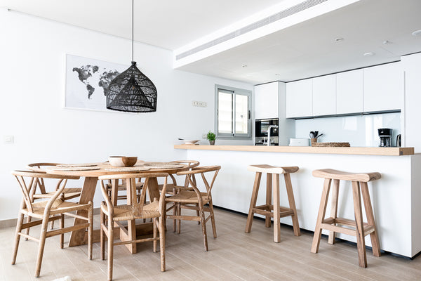 Wishbone chairs together with round table in Higueron West