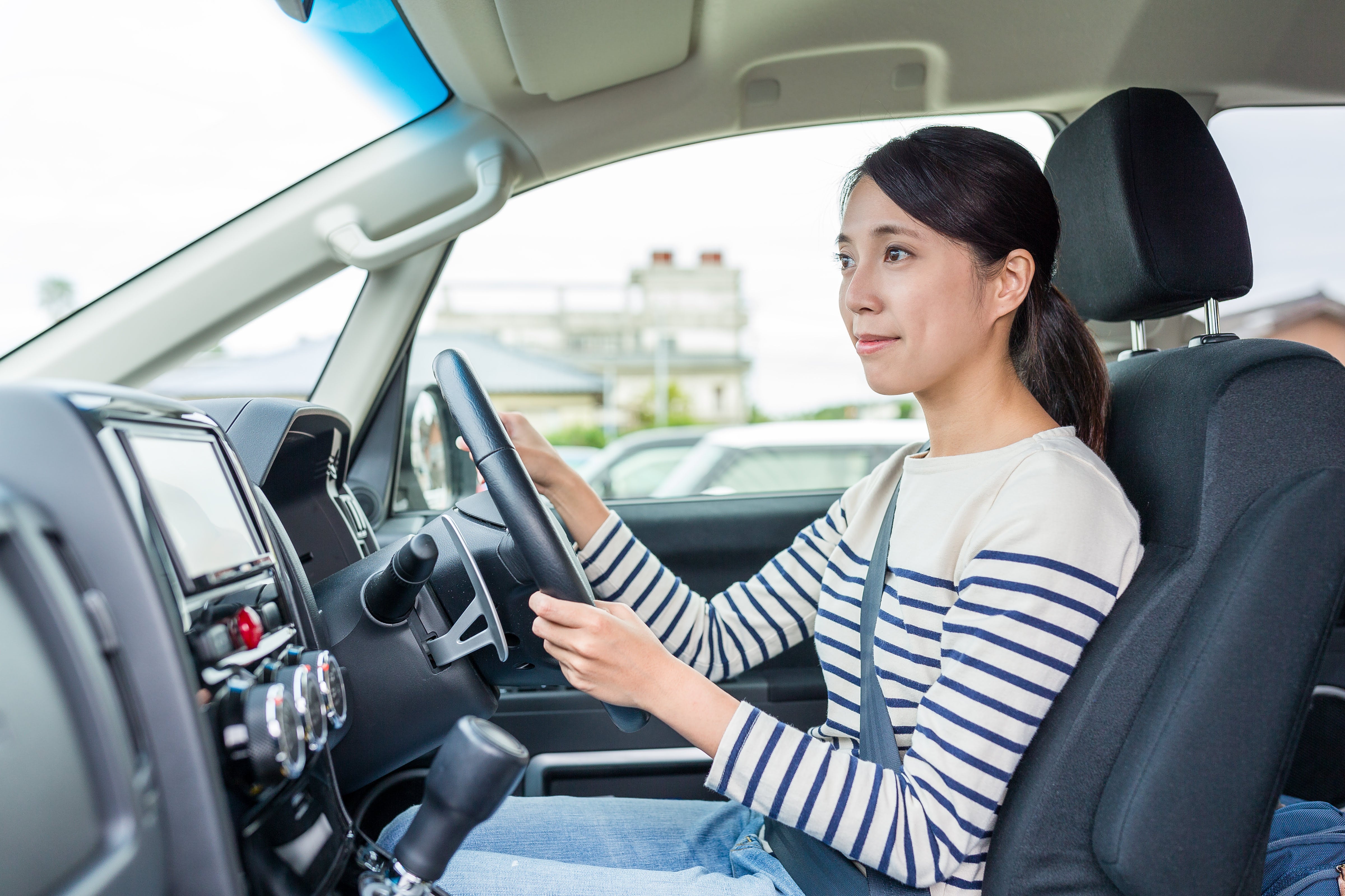 The Ultimate Guide: How to Obtain an International Driver's License for Japan, Japanese woman driving, Japan