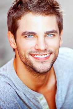 handsome man with blue eyes and brown hair