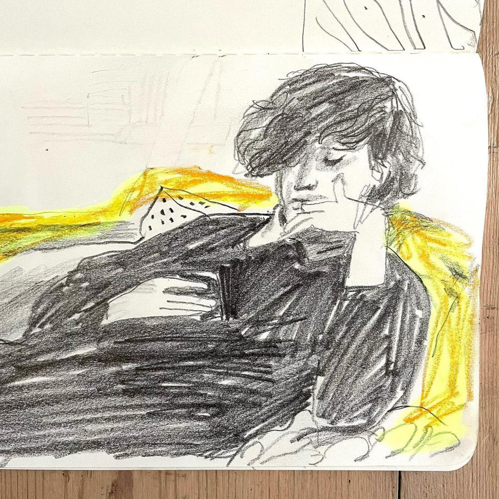 hand drawn portrait of person laying on couch by ella beech