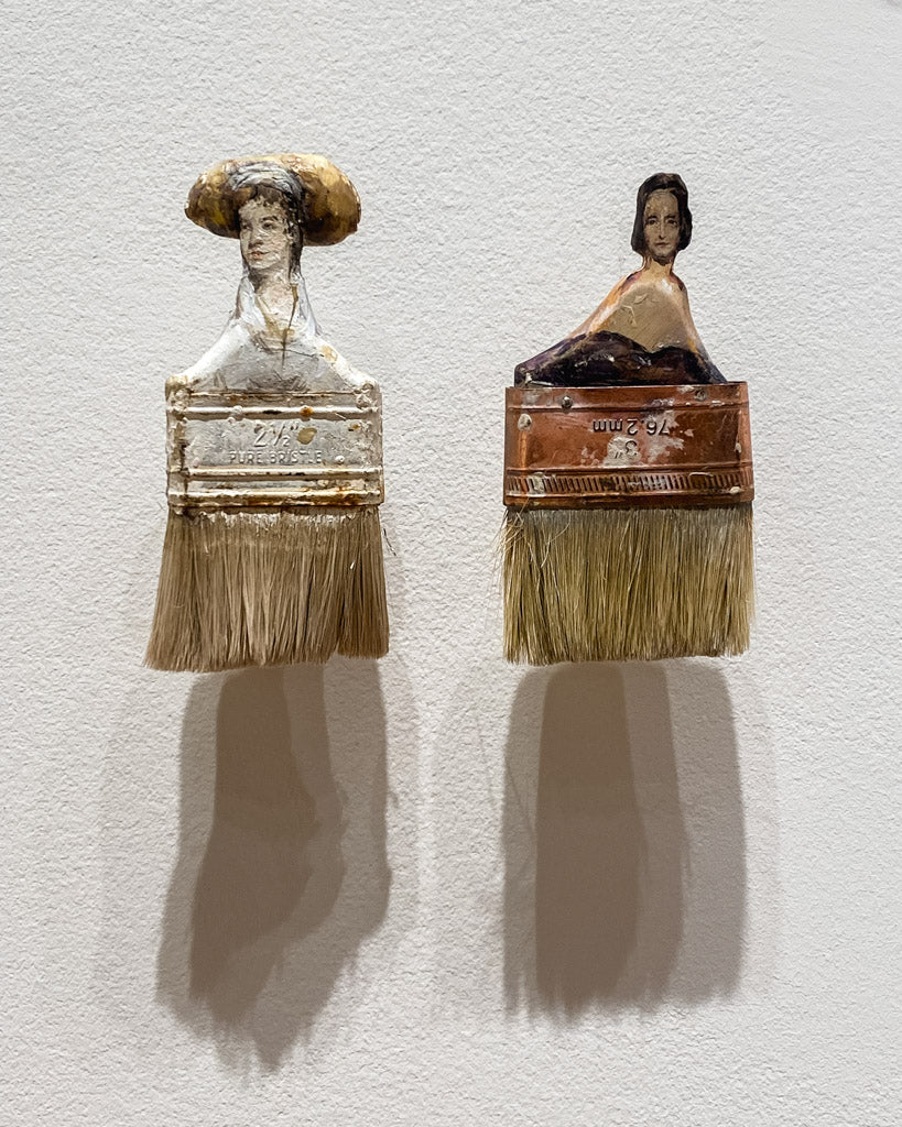 art exhibit by rebecca szeto of well-worn paint brushes transformed into elegantly painted portraits