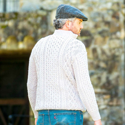 Man Wearing Aran Sweater and Flat Cap
