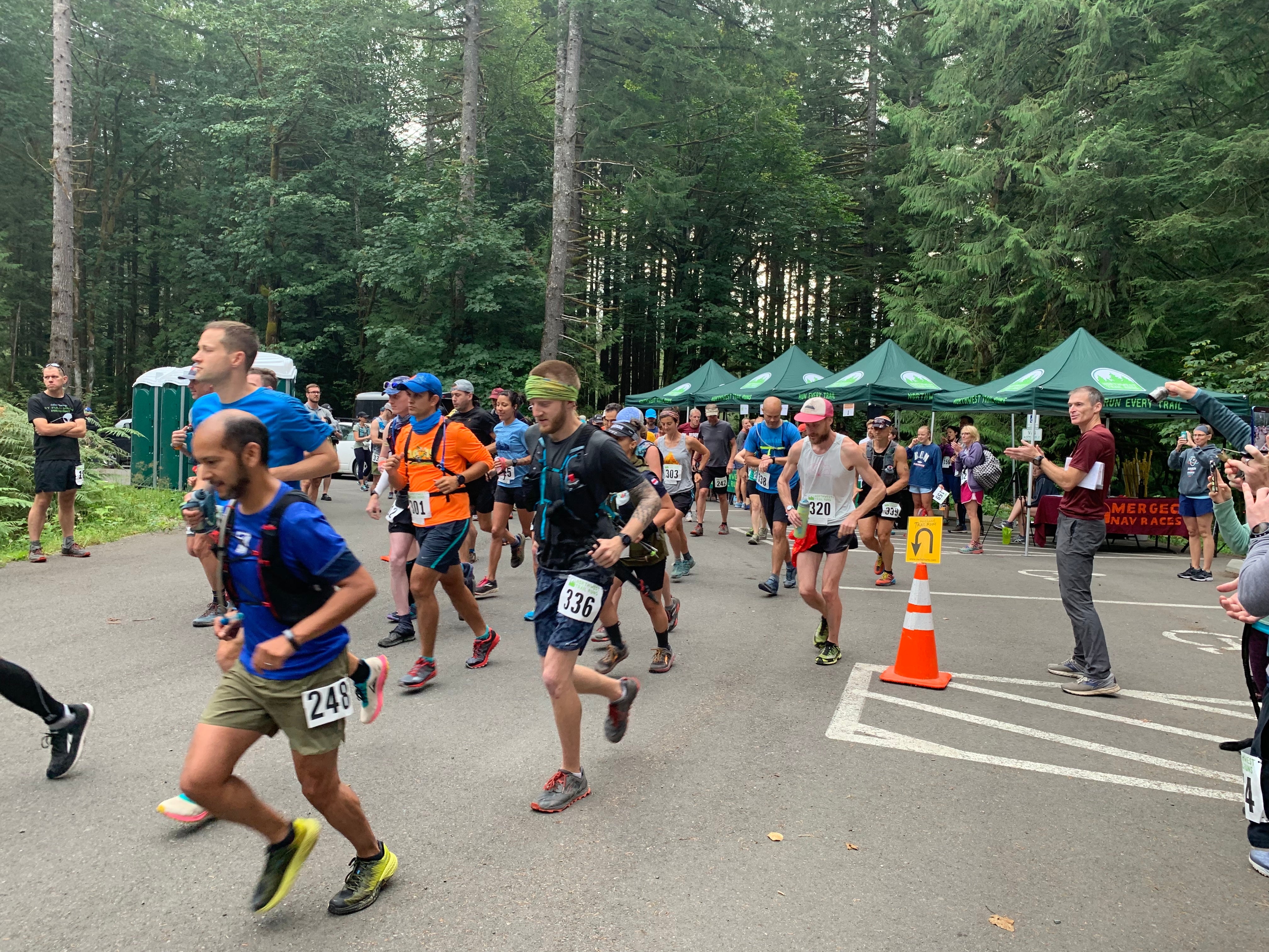 Bone (right in red shirt) cheers on the start of the Middle Fork 50K, put on by Northwest Trail Runs.
