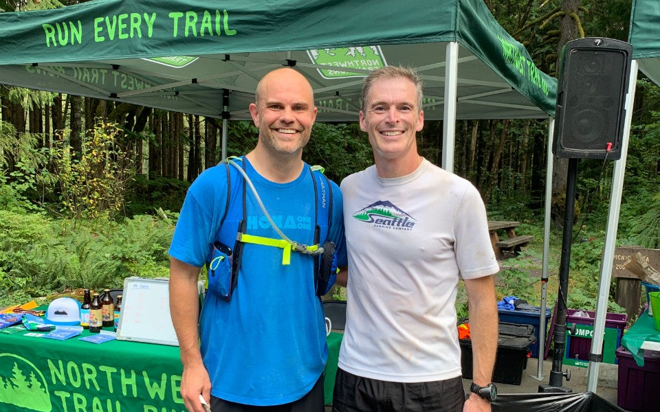 SHOES-n-FEET owner Chris Bentvelzen stands alongside Northwest Trail Runs company owner Eric Bone during Northwest Trail Runs recent Middle Fork 50K.