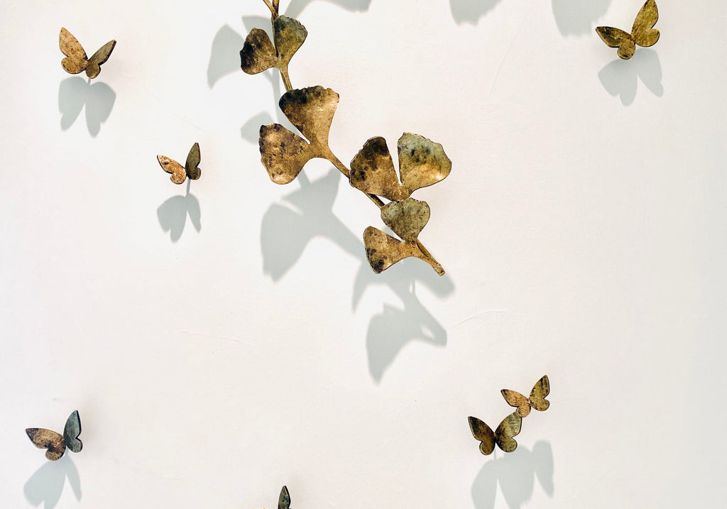 Close up of Butterfly and Ginkgo Wall Sculpture made of iron and steel