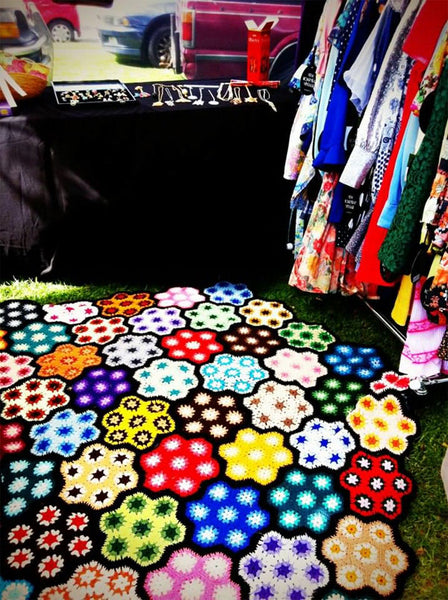 colorful quilt at the little big markets