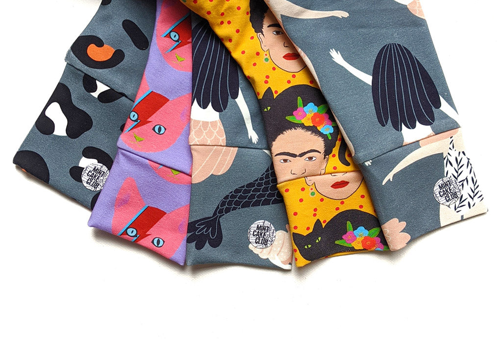 A pile of beautiful handmade children's leggings in gorgeous prints
