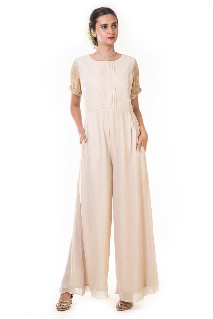 cream jumpsuit with sleeves