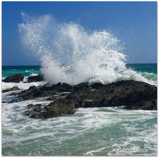 Ocean, splash of waves hitting the rocks.