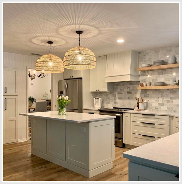 2 woven pendant lights above a small kitchen island.