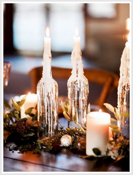 Tablescape with melted wax bottle decor.