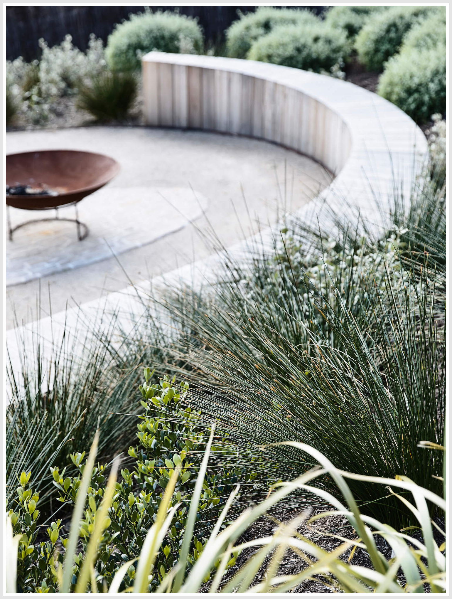 Serene surround highlight this fire pit and landscape