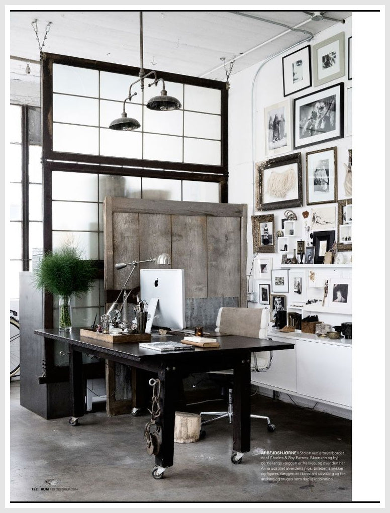 Workspace featuring rustic black and white furniture and decor