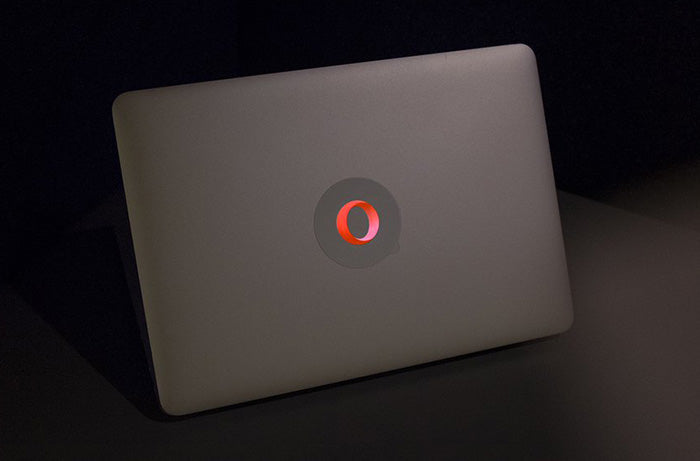 opera macbook sticker glowing on a macbook