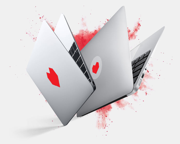 glwoing and opaque "hex heart" tabtag on a macbook
