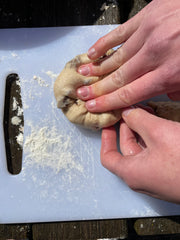 kneading hot cross bun dough