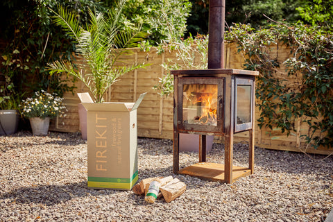 outdoor wood burning appliance and kiln dried logs with firelighters