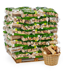Pallets of British kiln dried hardwood logs in small bags