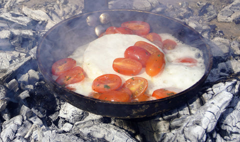 bruschetta cooking on the firepit