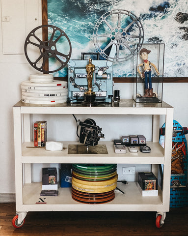 Film Cart storage with projector and film canisters 