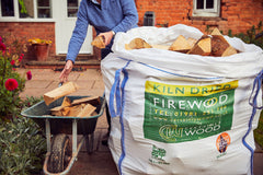 unloading kiln dried logs