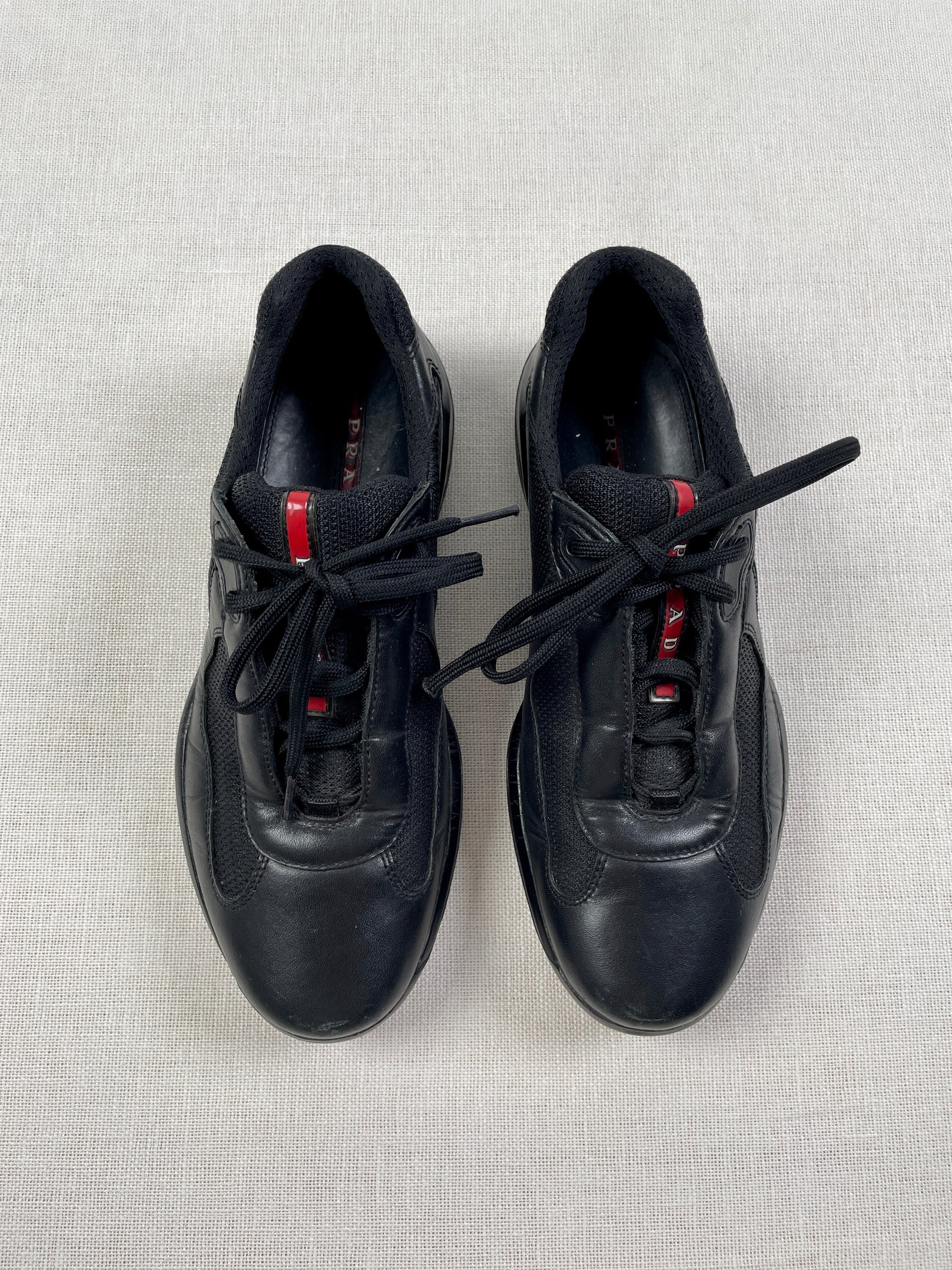 Prada America's Cup Black Leather & Mesh Sneakers | FAULKNER Luxury -  Faulkner