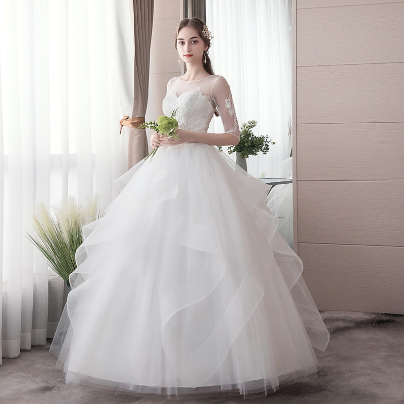 Wedding dress with multi-tiered skirt