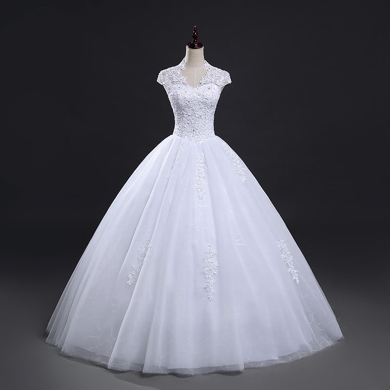 Ball gown wedding dress with cap sleeves