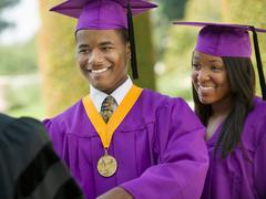 young man and woman gradulating