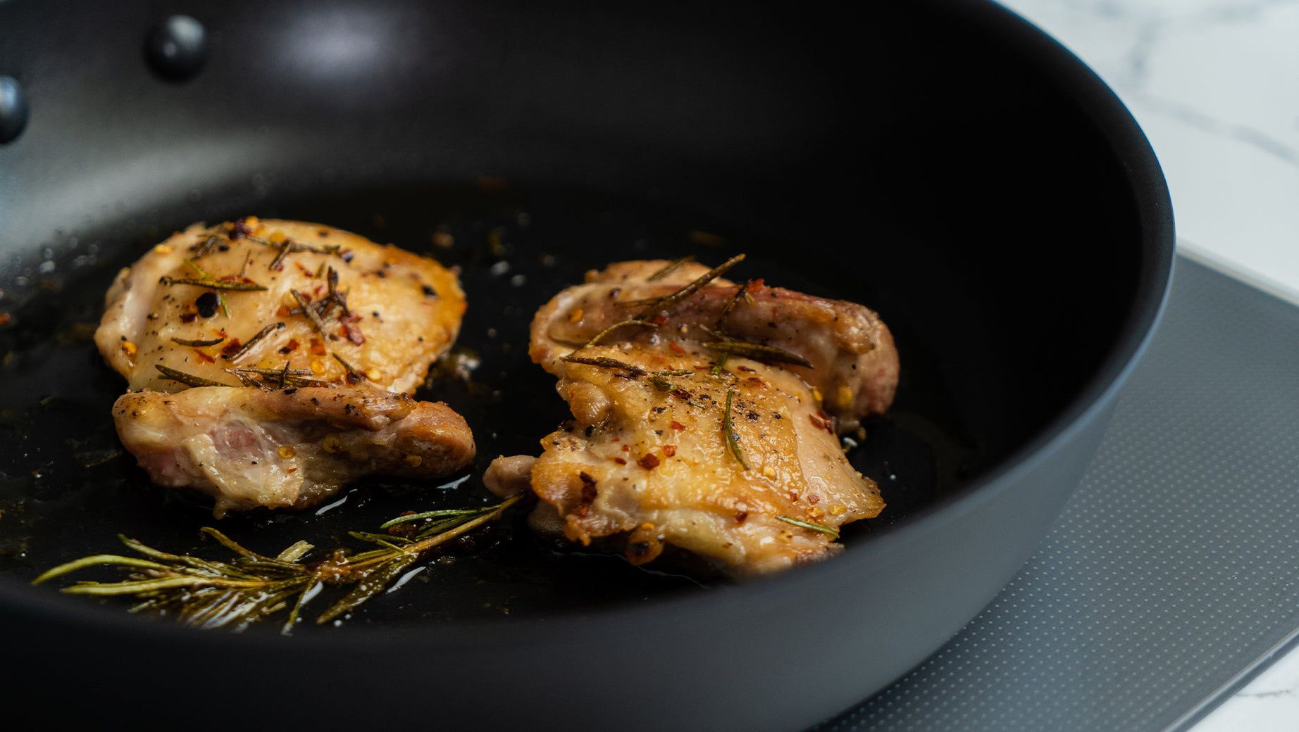 Searing chicken wings with Meyer Alunmium Nonstick Skillet