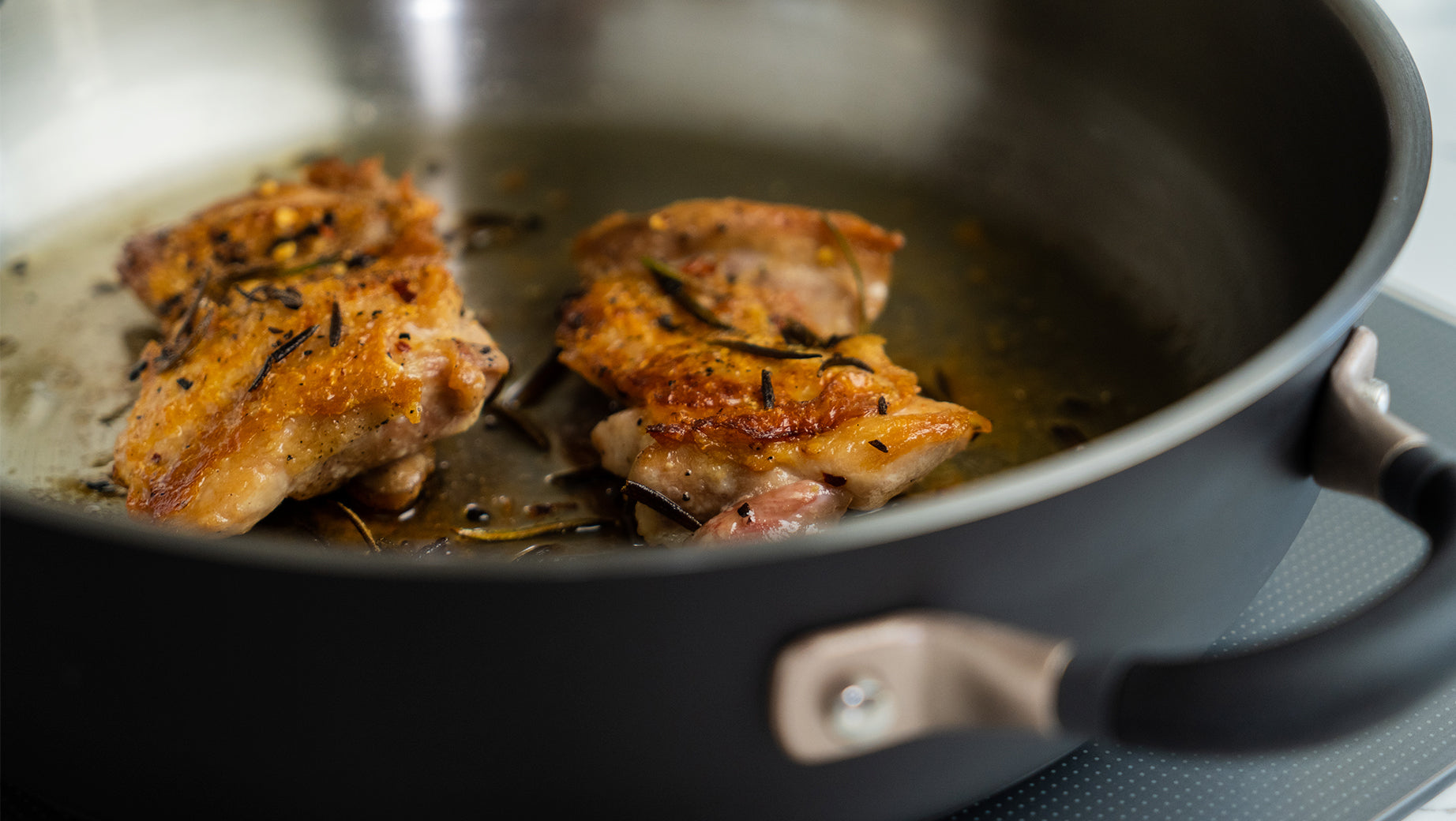 Searing chicken wings with Meyer Stainless Steel Searing Pan