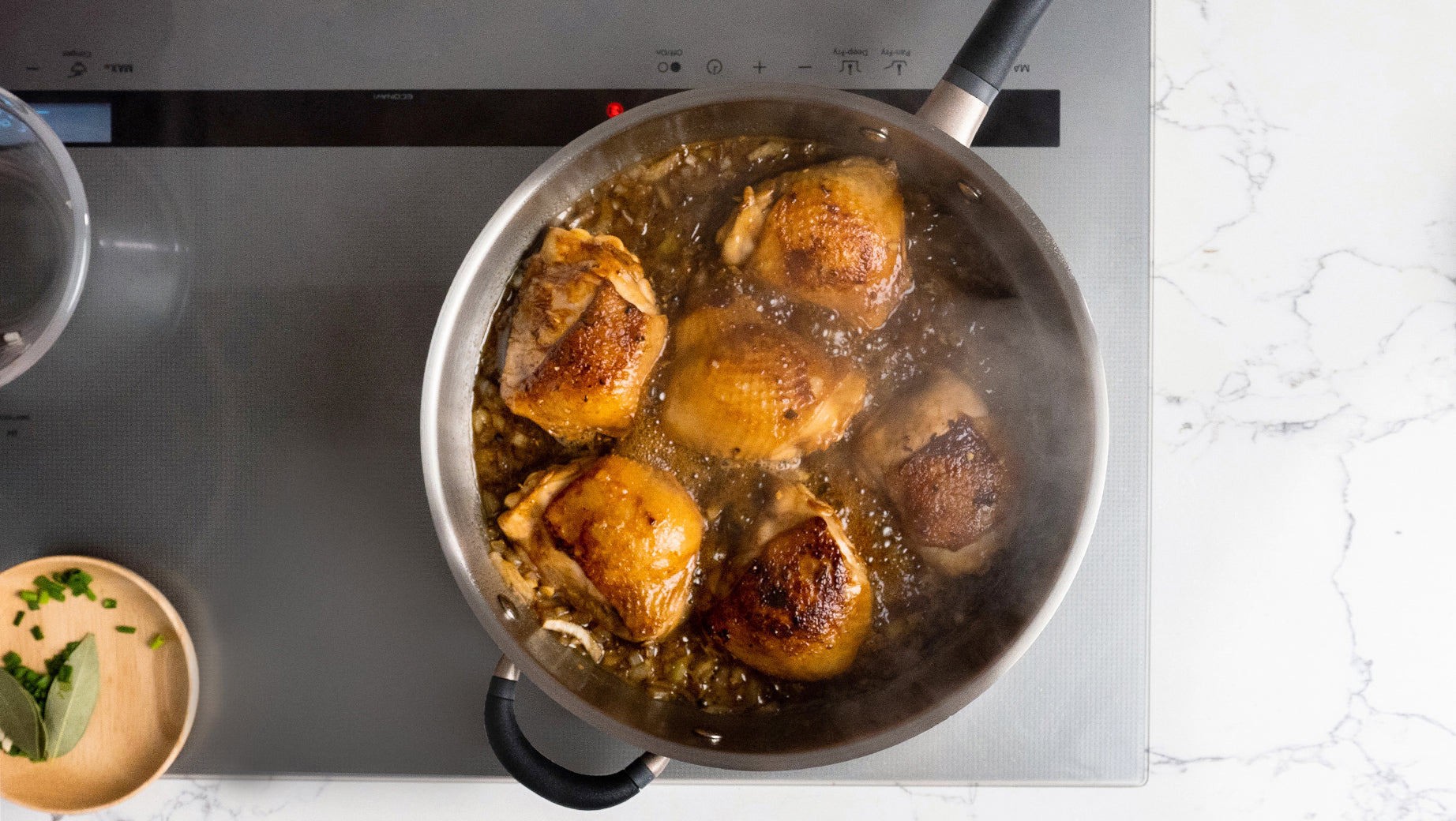 Cooking saucy adobo chicken with a Meyer stainless steel searing pan on an IH induction cooker