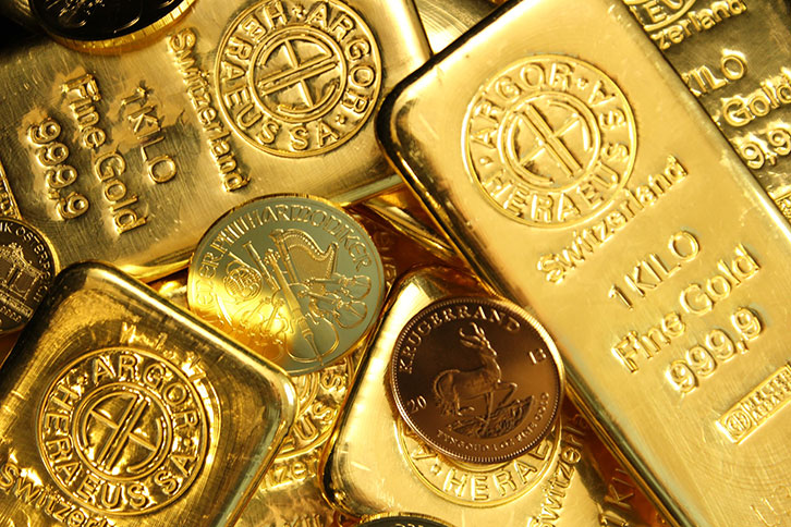 A collection of fine gold bars and coins including Swiss 1 kilo bars.