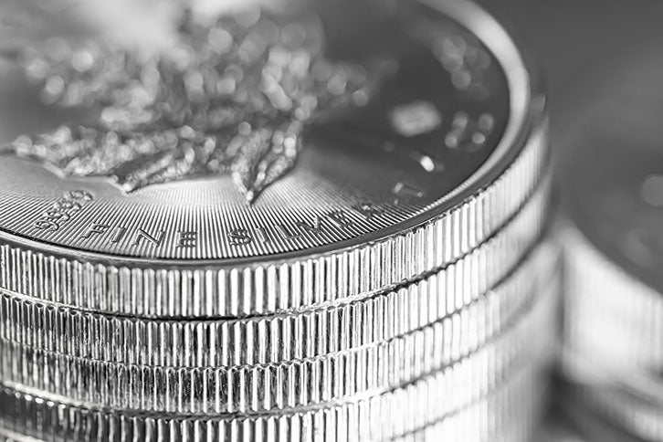 A stack of 1 oz Canadian Silver Maple Leaf coins