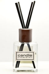 custom reed diffuser in clear 4oz jar and black reeds